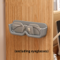 Wall mounted eyeglass storage rack